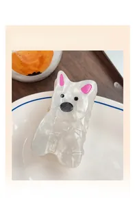 Detail der Haarklammer mit Cartoon-Französischer-Bulldogge aus weißem Marmor-Acetat