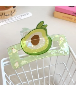 Detail of avocado themed square hair claw clip with green marble texture and spring
