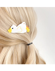 Cute white bird acrylic hair clip worn on blonde hair side for a stylish minimalist look