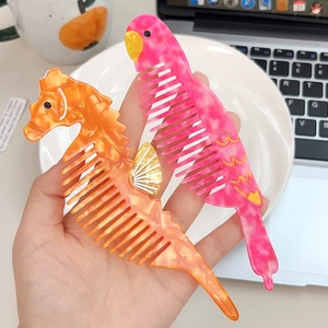 Chic acetate hair combs in sea horse and bird shapes with marble texture pattern