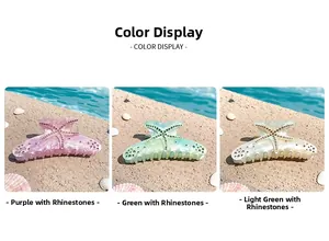 Detailed view of starfish claw clips with marble texture and rhinestones in three colors