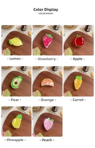 Selection of eight different colorful acrylic fruit and vegetable hair claw clips for women