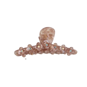 Eleganter Haarklammer aus rosa Harz mit 3D-Blumenmotiven und funkelnden Strasssteinen