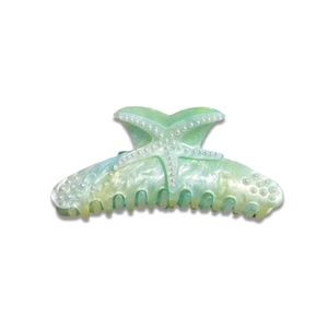 Chic starfish hair claw clip with mint green pearlescent finish and pearl embellishments