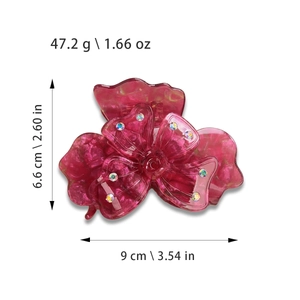 Pince à cheveux trèfle rouge rose élégante avec strass et texture marbrée chic