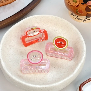 Three-piece set of cute candy-colored fruit hair claws including apple and watermelon designs