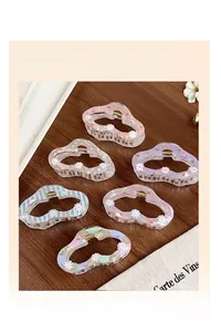 Lot de 6 pinces à cheveux colorées à motif marguerites avec bords ondulés