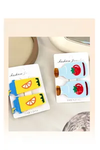 Set of 4 cute cartoon hair clips featuring orange and tomato juice bottle designs