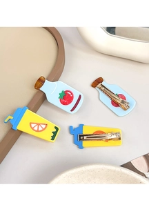 Detail of creative resin hair clips with tomato juice and lemon tea cartoon designs
