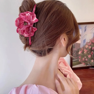 Grande molletta per capelli a fiocco in acetato marmorizzato rosa da donna