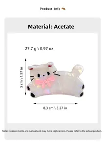 Détail de la pince à cheveux chat en acétate blanc nacré avec nœud rose et taille de 8,3 cm