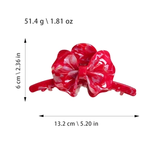 Grande molletta per capelli a fiore rosso in acetato con elegante trama marmorea