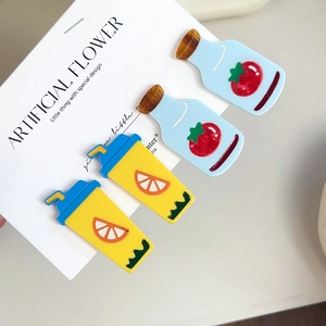 Set of 4 cute cartoon hair clips featuring tomato juice bottle and lemon tea cup designs