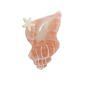 Pink acetate seashell hair claw clip with starfish detail and marble texture effect