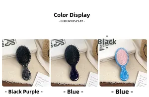 Detailed view of portable acetate mini hairbrushes with soft massage bristles and marble texture