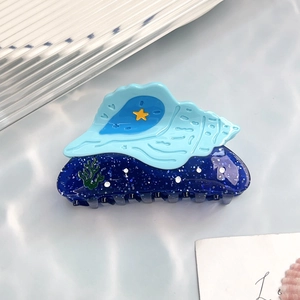 Blue ocean-themed acetate shell hair claw with starfish and silver glitter accents