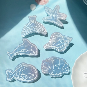 Nautical PVC hair claw set with blue gradient starfish dolphin and seashell designs