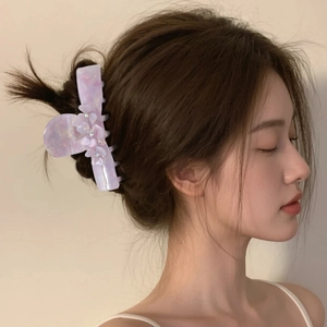 Large acetate hair claw clip with floral relief and crystals in lavender marble finish