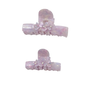 Elegant large acetate hair claw clip with lavender marble texture and rhinestone flowers