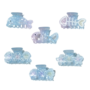 Iridescent ocean theme hair claw clips set featuring starfish shell and dolphin shapes