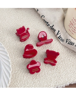Macro shot of 5pcs dark red resin hair clips with elegant France Handmade gold lettering