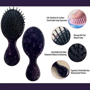 Floral purple acetate hairbrush with ergonomic handle and massaging bristles on white background