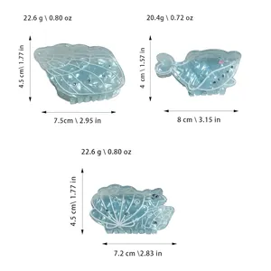 Size guide for summer ocean style hair clips including whale and seashell claw clip dimensions