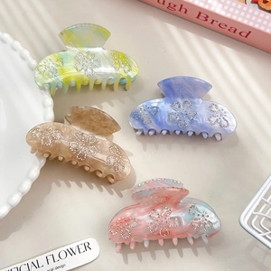 Set of 4 elegant floral shark clips with rhinestones and marble texture for hair styling