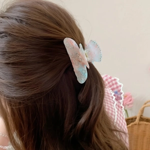 Elegant floral butterfly hair claw clip with rhinestones and marble texture for women