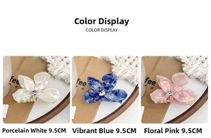 Three 9.5cm flower hair claws in white, blue and pink acetate with center rhinestone