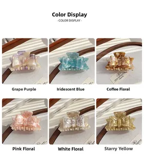 Color display of acetate bow hair claws in purple, blue, brown, pink, white, and yellow