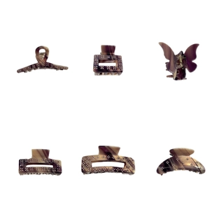 Set of 6 marble textured acetate hair claws in brown and purple with rhinestone flowers