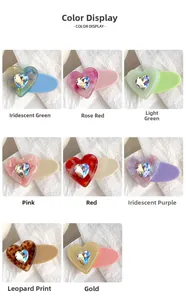 Detail showing various colors of heart hair clips with faceted crystal accents
