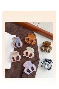Detailed set of six marble and tortoiseshell acetate hair claws in various elegant patterns