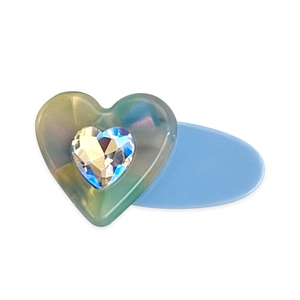 Exquisite heart-shaped hair clip with marble resin and iridescent gemstone in blue