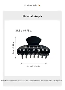 Détails d'une pince à cheveux noire en acrylique avec motifs de lune et d'étoiles