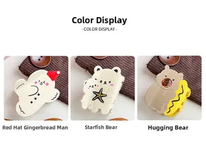 Detailed views of cute gingerbread man and teddy bear acetate hair claw clips for women
