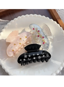 Détails de l'ensemble de pinces à cheveux en acrylique avec motifs lune et étoile en métal