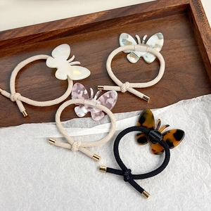 Lot de 4 élastiques à cheveux papillon en acétate marbré, blanc perle et rose avec doré