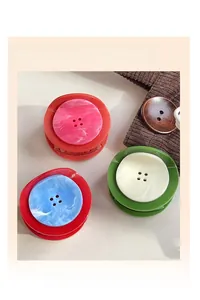 Trois pinces à cheveux créatives en forme de bouton avec texture marbrée sur velours
