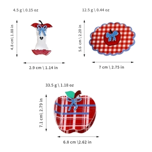 Three creative apple-shaped plaid hair claws with blue bows and size measurements