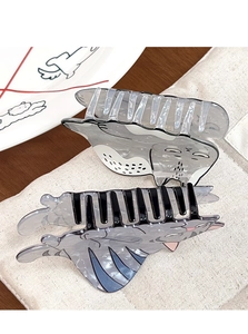 Detailed view of cute grey polka dot and striped cat hair claws with glossy finish