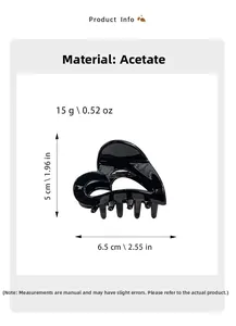 Detailansicht der schwarzen Herz-Haarklammer aus Acetat mit Größe 6,5cm und 15g Gewicht