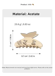 Vue détaillée de la pince à cheveux papillon en acétate avec strass et dimensions du produit