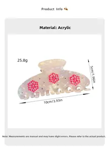 Detail view of pearlescent snowflake hair claw clip with size dimensions 10cm by 5cm