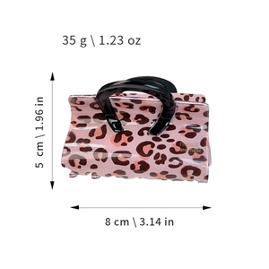 Pink leopard print cellulose acetate hair claw clip with black handle measurement view
