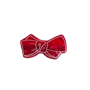 Retro red acrylic bow hair clip with golden glitter and silver wire outlines
