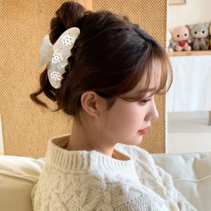 Elegant butterfly hair claw with pearl white finish and crystals for Christmas hairstyles