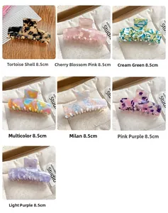 Détail de pinces à cheveux en acétate de 8,5 cm en sept couleurs et textures marbrées