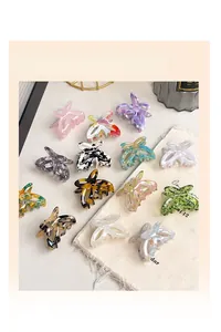 Various acetate butterfly hair claws in marble and tortoiseshell patterns display